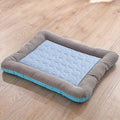 Cooling mat for pets with raised padded edge |