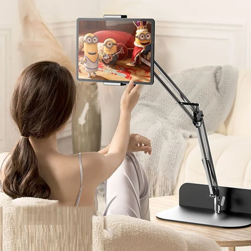 Extendable, concealed phone/tablet holder at the bed