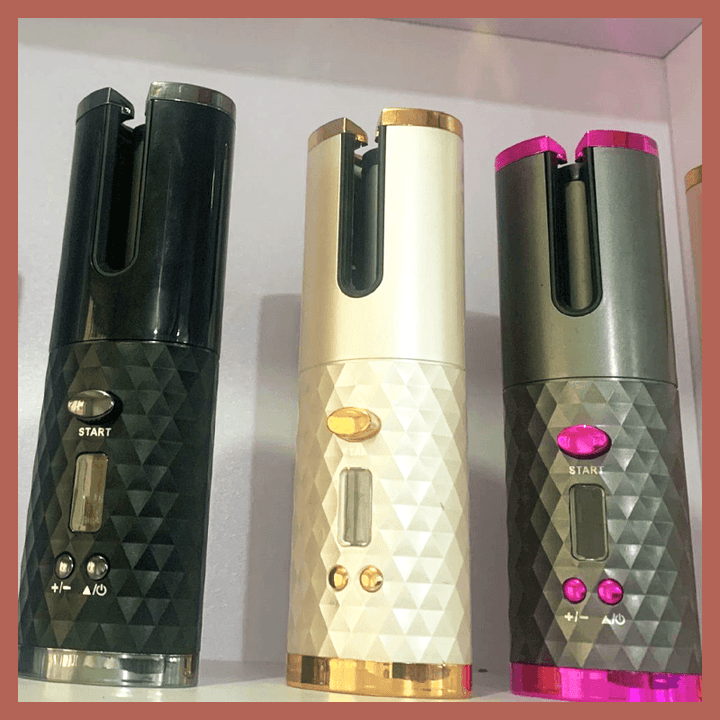Cordless automatic rotating curling iron