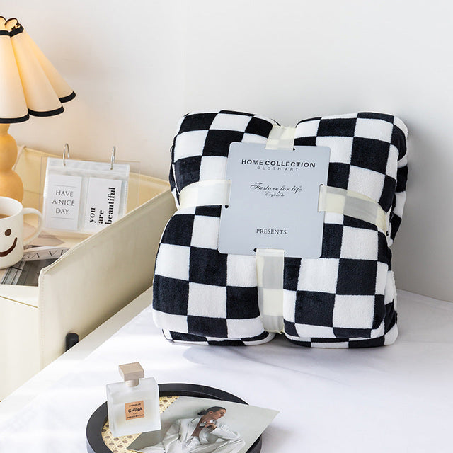 Stylish blanket in checkered pattern for your home