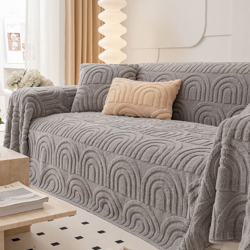 Thick quilted sofa cover for secure fit