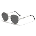 Women round sunglasses with elegant metal frame and mirrored lenses