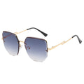 Women's geometric designer sunglasses with mirrored lenses