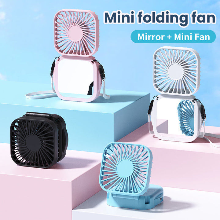 Unisex nan compact foldable clip on handheld desk fan with built in mirror adjustable tilt and USB rechargeable battery