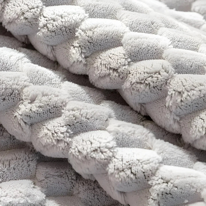 Luxurious velvet sofa cover with textured pattern