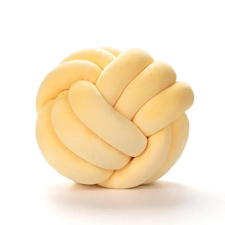 Decorative, soft cushion with knotted ball in suede look