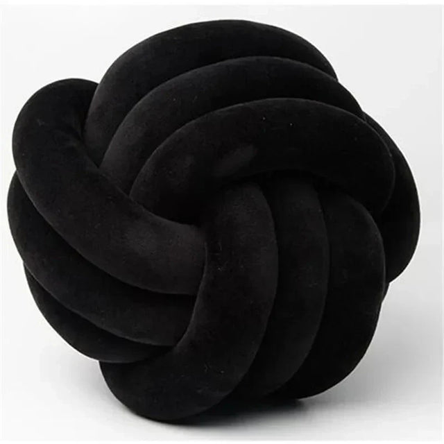 Decorative, soft cushion with knotted ball in suede look