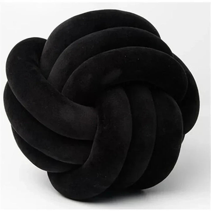 Decorative, soft cushion with knotted ball in suede look