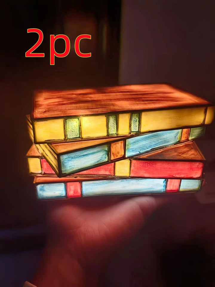 Desk lamp with stacked books