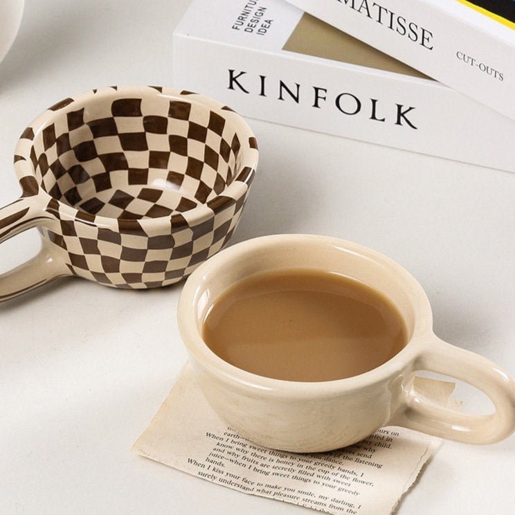 Ceramic mug with irregular checkerboard pattern