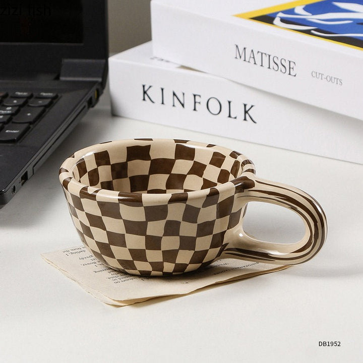 Ceramic mug with irregular checkerboard pattern
