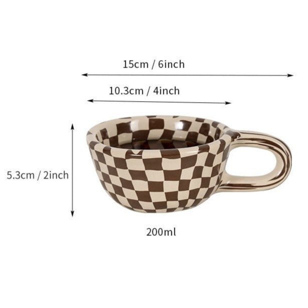 Ceramic mug with irregular checkerboard pattern