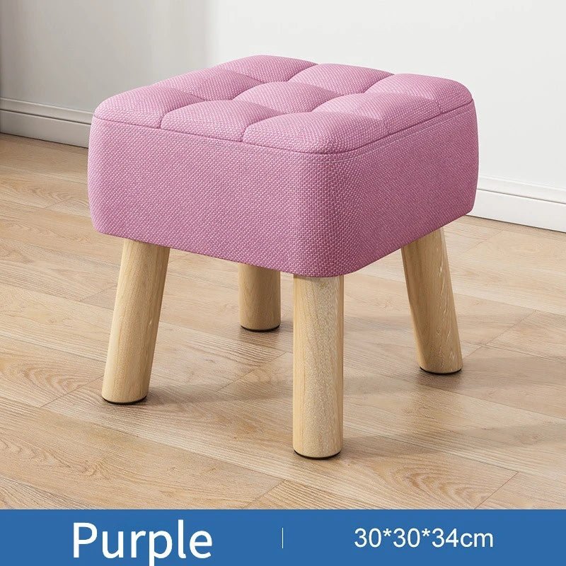 Padded ottoman stool in retro style in pastel colors