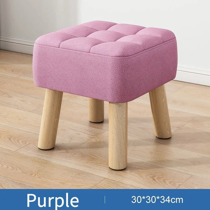 Padded ottoman stool in retro style in pastel colors