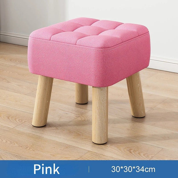 Padded ottoman stool in retro style in pastel colors