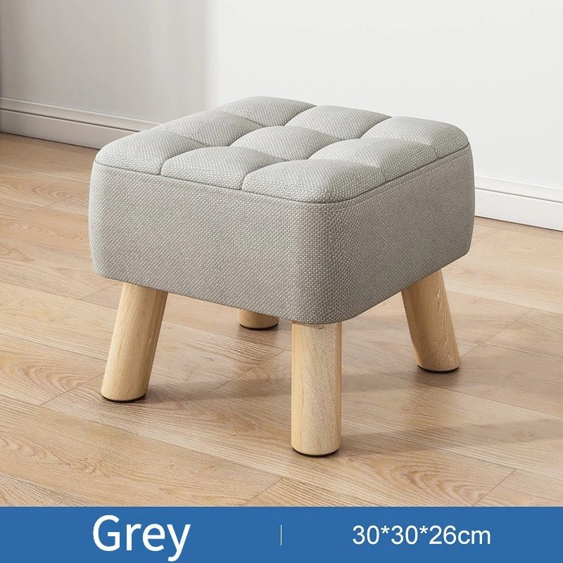 Padded ottoman stool in retro style in pastel colors