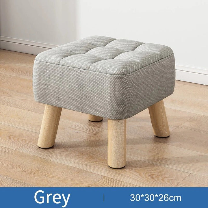 Padded ottoman stool in retro style in pastel colors