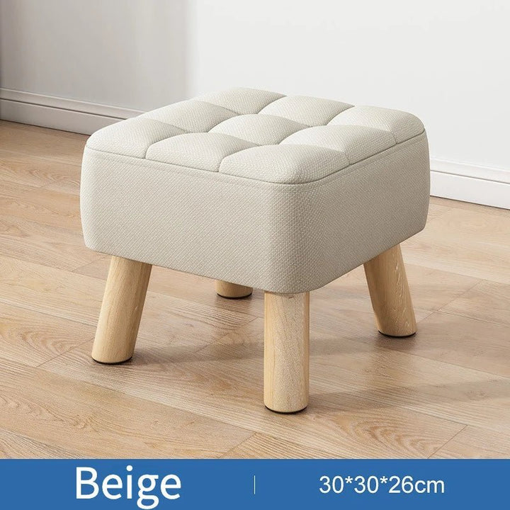 Padded ottoman stool in retro style in pastel colors