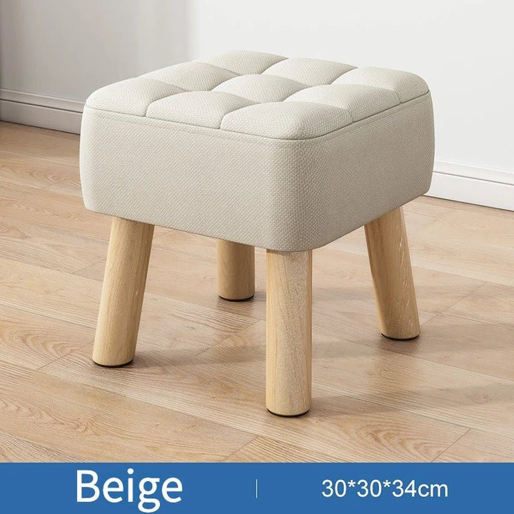 Padded ottoman stool in retro style in pastel colors