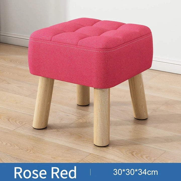 Padded ottoman stool in retro style in pastel colors