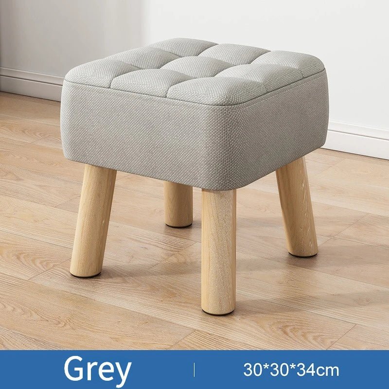 Padded ottoman stool in retro style in pastel colors