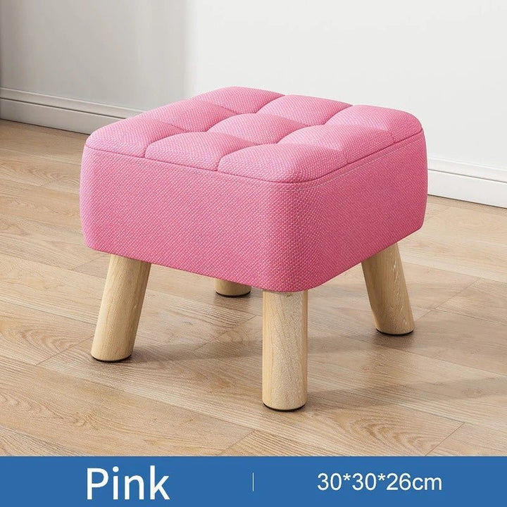 Padded ottoman stool in retro style in pastel colors