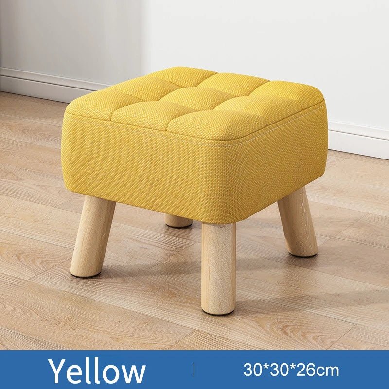Padded ottoman stool in retro style in pastel colors