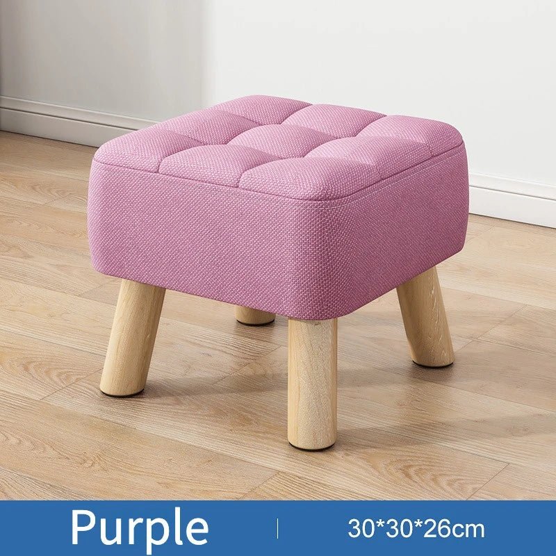 Padded ottoman stool in retro style in pastel colors
