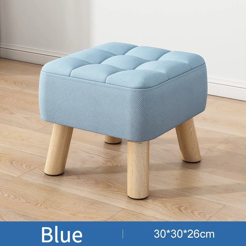 Padded ottoman stool in retro style in pastel colors