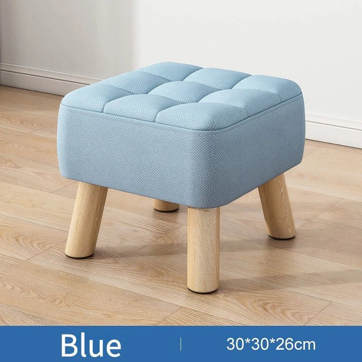 Padded ottoman stool in retro style in pastel colors