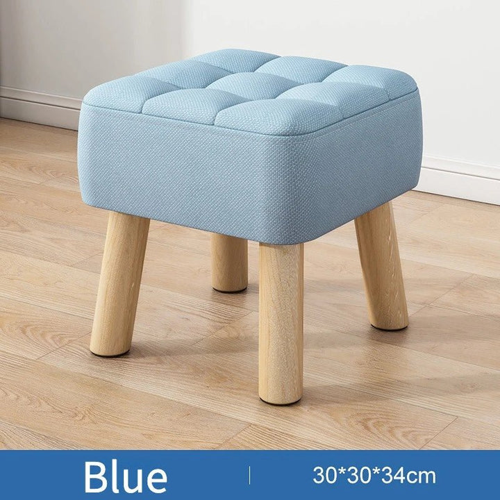 Padded ottoman stool in retro style in pastel colors